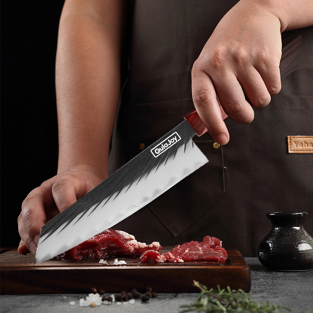 QulaJoy Chef Knife with a sharp double-edged blade, ideal for precise cutting, featuring a wooden handle. The knife is used to slice fresh meat on a wooden cutting board, showcasing its professional quality.