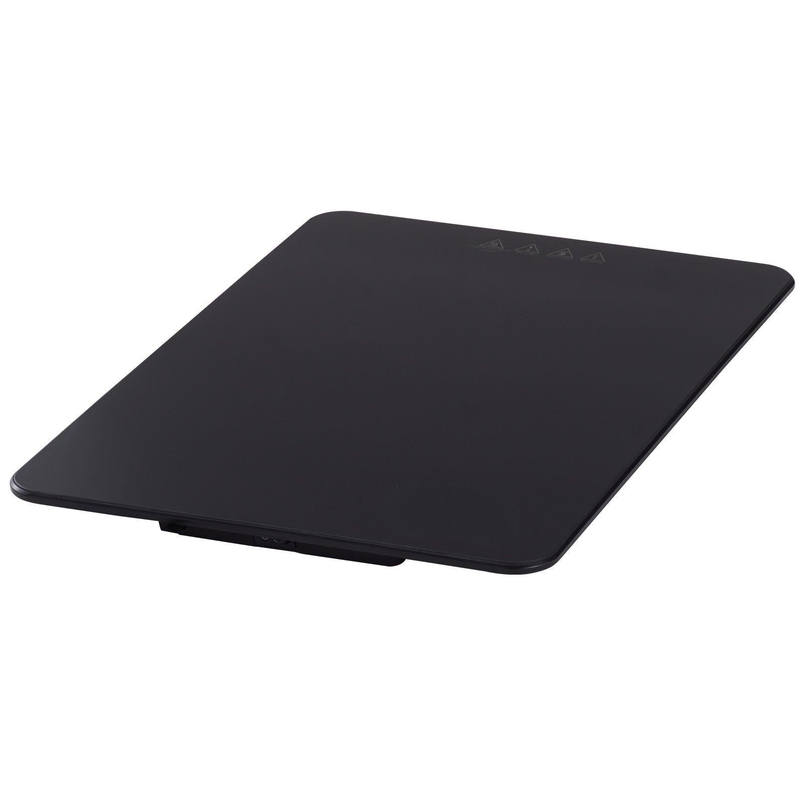 Coocosh warming tray, featuring a modern black design and tempered glass material, perfect for keeping dishes warm during upscale events.