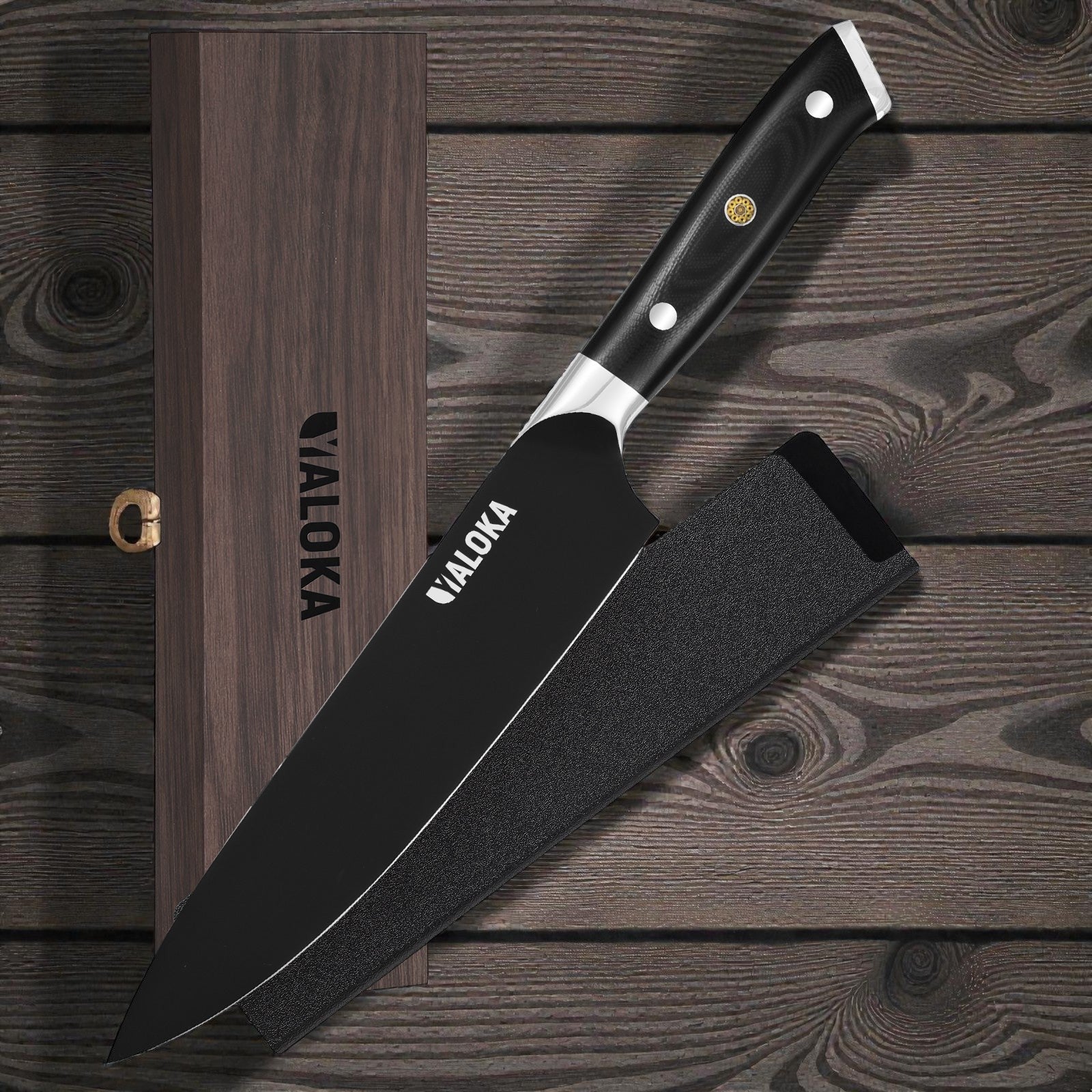YALOKA Chef's knife in a black protective sheath, presented with its dark wooden storage box on a rustic wood background, highlighting its sleek design and premium craftsmanship.