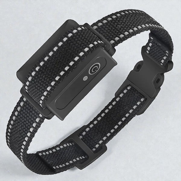 Coocosh black dog collar with reflective stitching and a control module, featuring a quick-release buckle for secure and comfortable wear. This close-up shot highlights the durable nylon construction and subtle branding elements of the accessory.