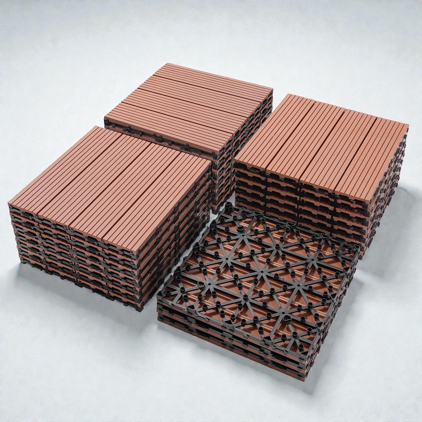 Coocosh interlocking deck tiles in a wood-grain brown finish, featuring a grid base for drainage, stacked for display. These versatile tiles are ideal for patios and outdoor spaces, showcasing their modular design and durable construction for a modern aes
