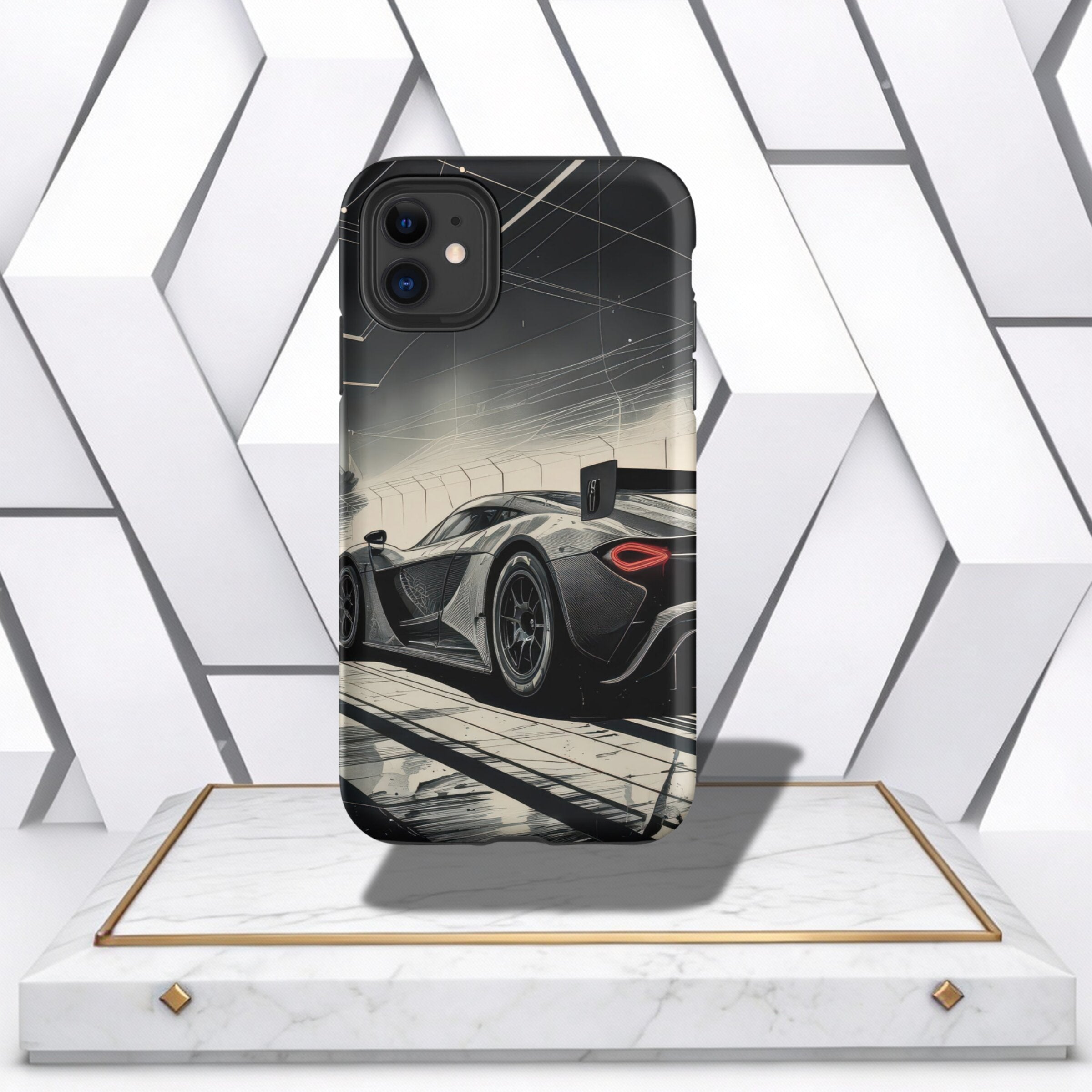 Coocosh Phone Case showcases a sleek, sporty car design, rendered in monochrome with dynamic lines, for the Apple iPhone 11, displayed on a marble stand against a modern backdrop. The cool aesthetic and protective qualities make it a must-have. The viewin