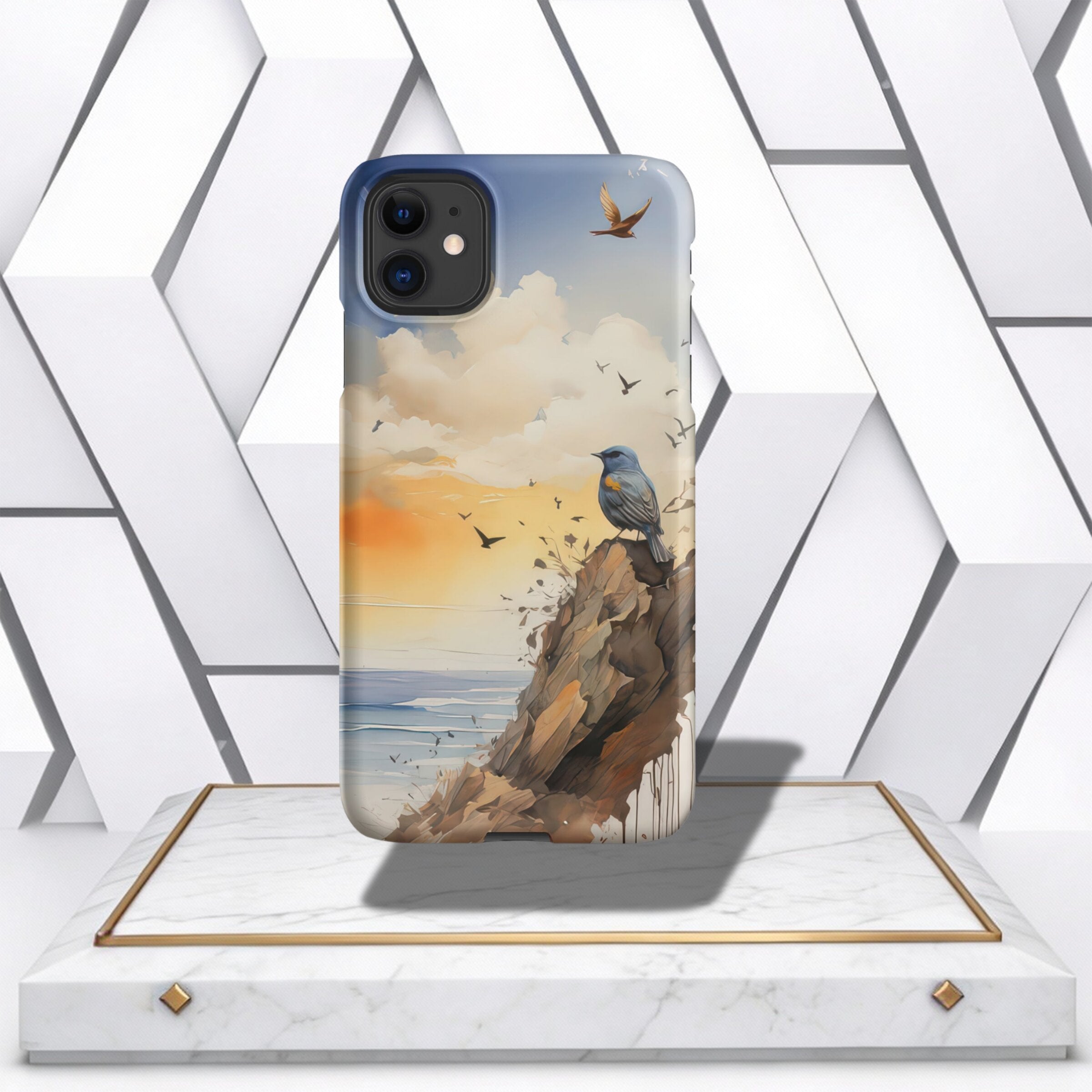 Coocosh Phone Case featuring a watercolor bird on a rocky cliff overlooking the ocean at sunset, creating a scenic, nature-inspired design for phone protection. The colors are vibrant, with a unique, artistic perspective and a touch of serenity for everyd