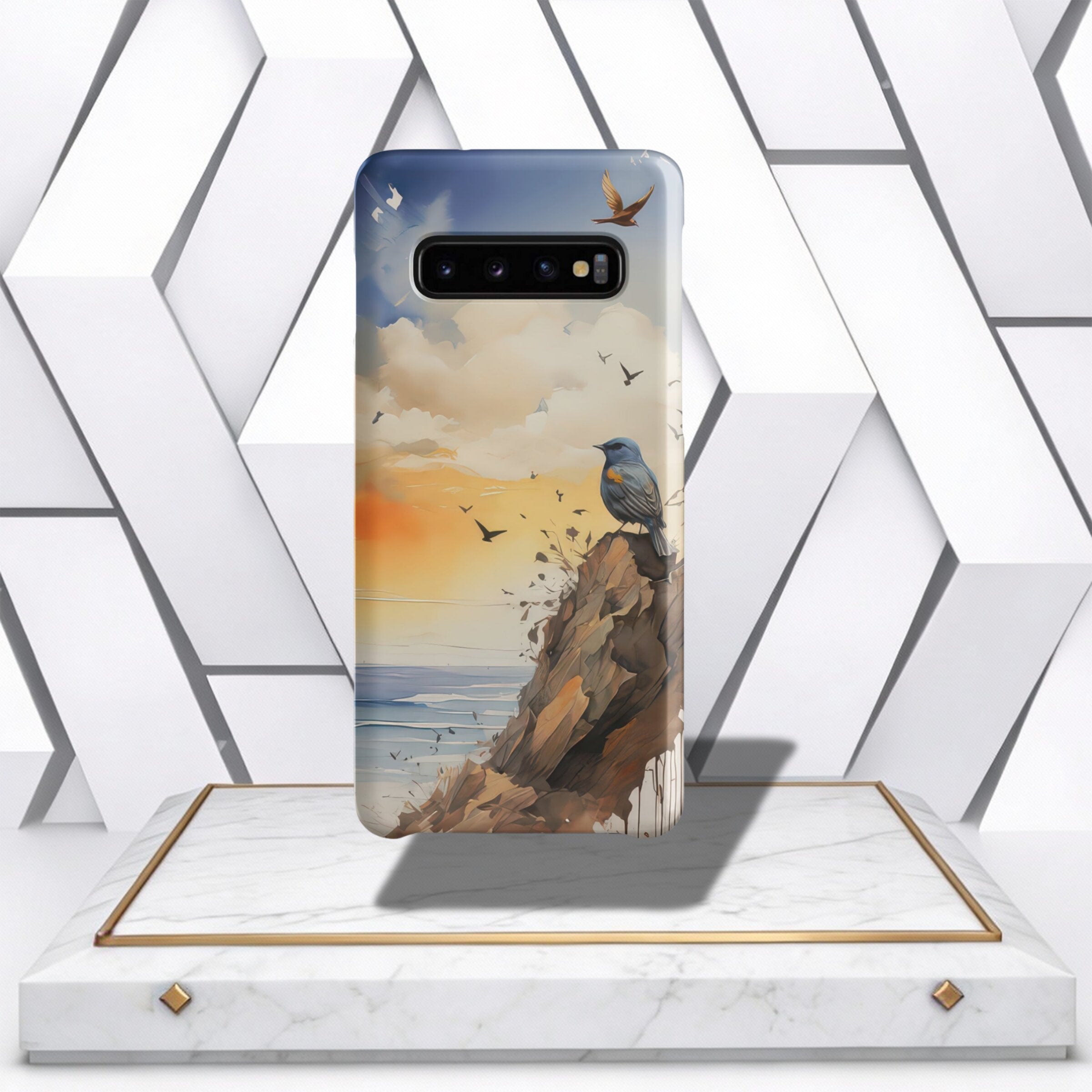 Coocosh Phone Case featuring a nature scene with a perched blue bird on a cliffside overlooking the ocean at sunset. A durable case protecting your phone with artistic style. Standard.