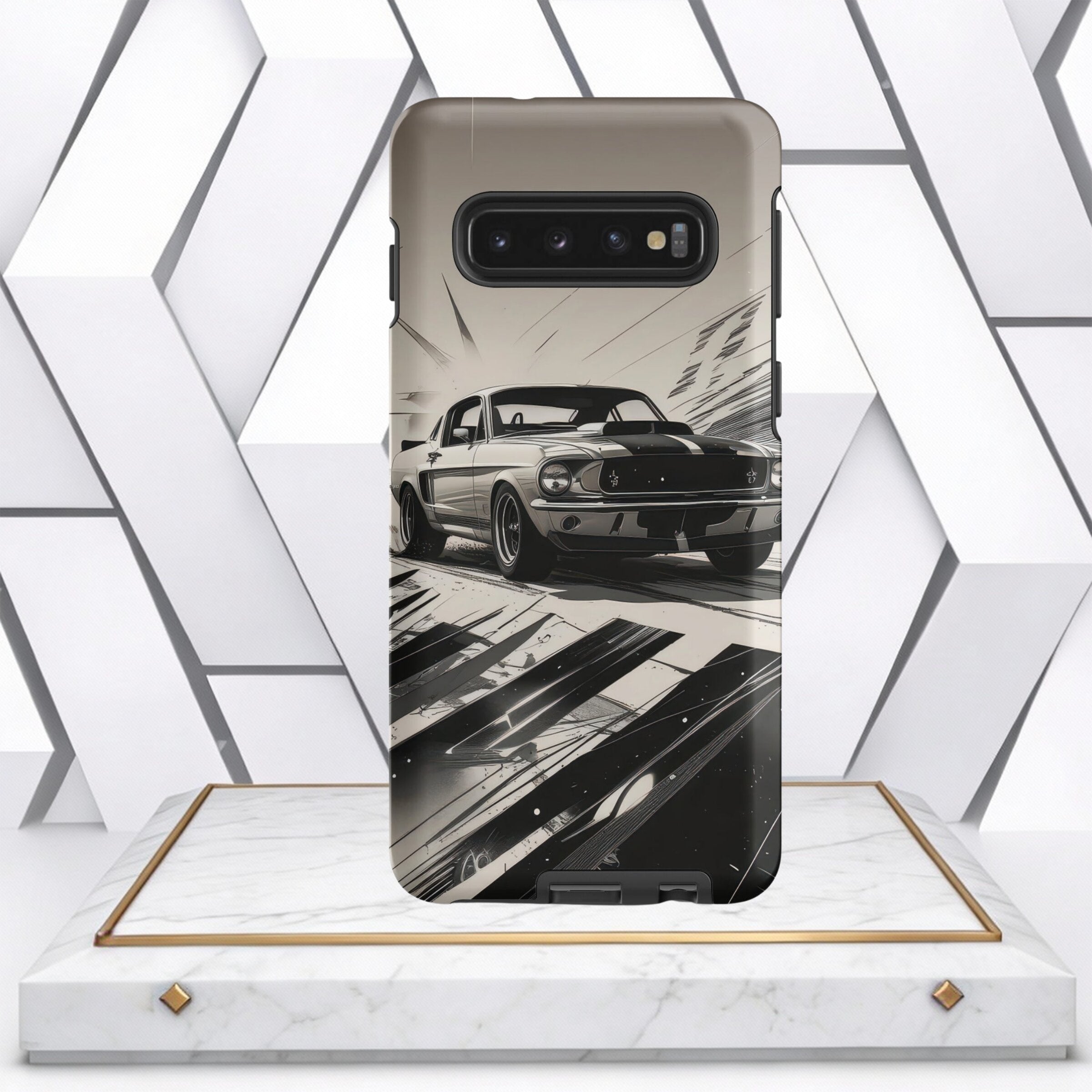 Coocosh phone case featuring a classic muscle car design in grayscale, adding a touch of vintage automotive style to your tech accessory. Durable and protective with sleek lines. on display.