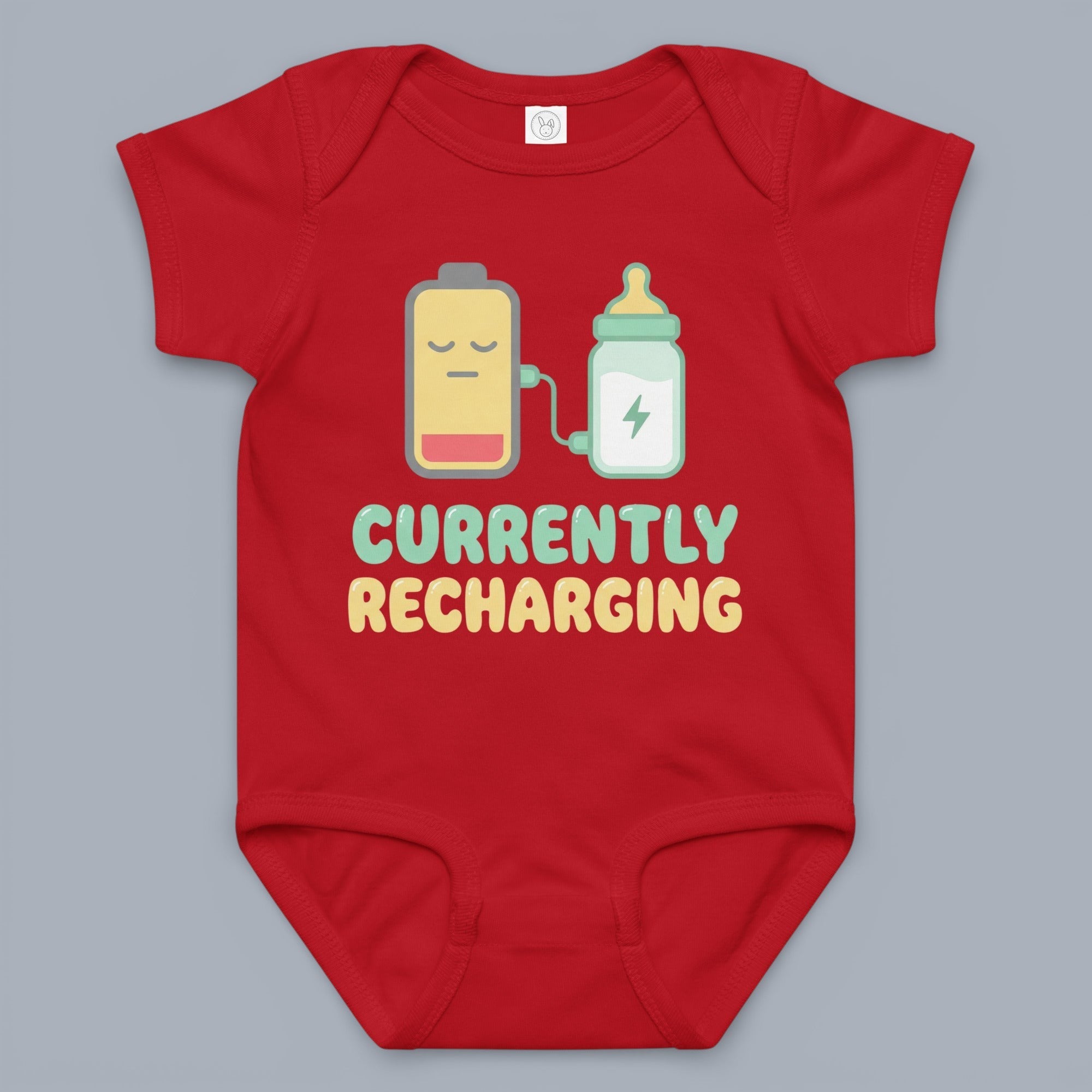Coocosh baby bodysuit features a funny design with a sad battery charging from a milk bottle, "Currently Recharging" text, short sleeves, made from soft fabric in red. A cute and comfy outfit.