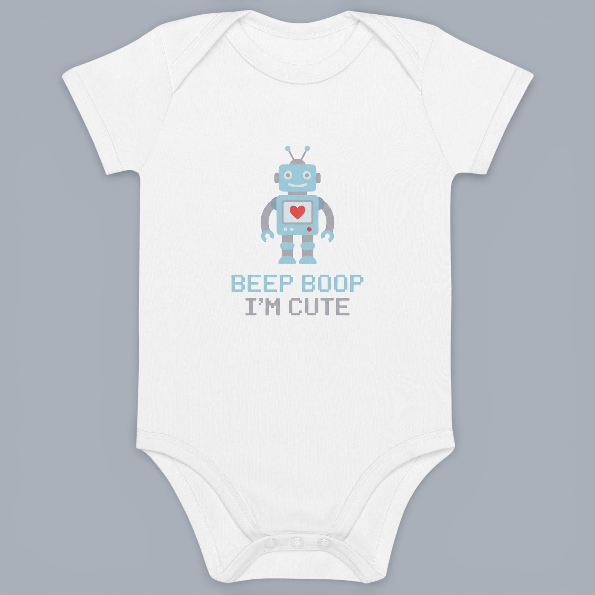 Coocosh Baby Onesie featuring a cute robot graphic and the text "Beep Boop I'm Cute", made of soft cotton, in white color. A charming and comfortable outfit for your little one.