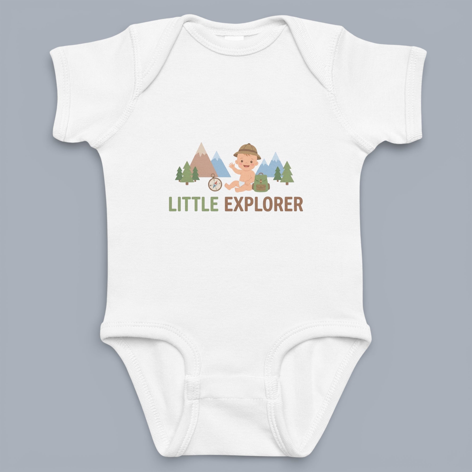 Coocosh Baby Onesie featuring a "Little Explorer" design with a baby explorer character, mountains, trees, and compass art in light shades on white cotton blend material. A comfy and stylish pick.