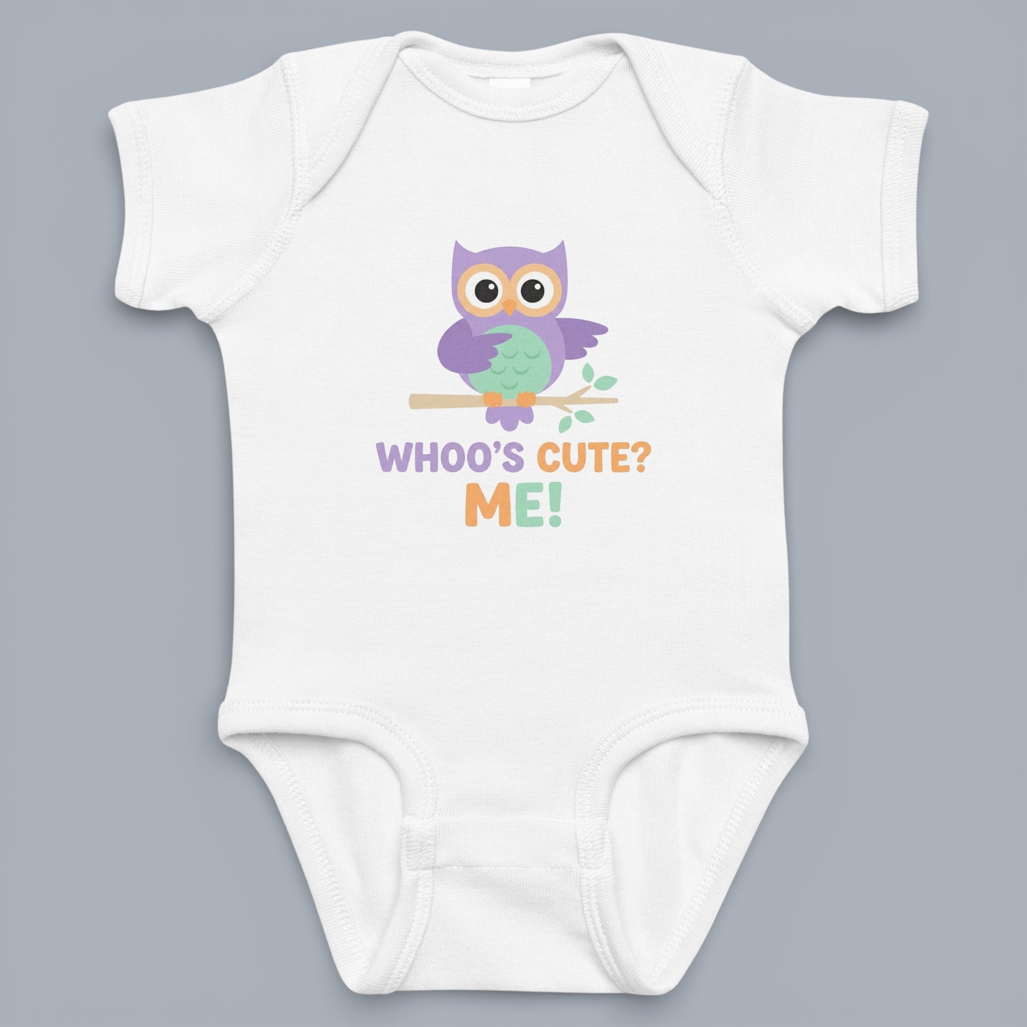 Coocosh Baby Bodysuit featuring a cute cartoon owl perched on a branch with the phrase "WHOO'S CUTE? ME!" in purple, light blue and orange on a white background. Period.