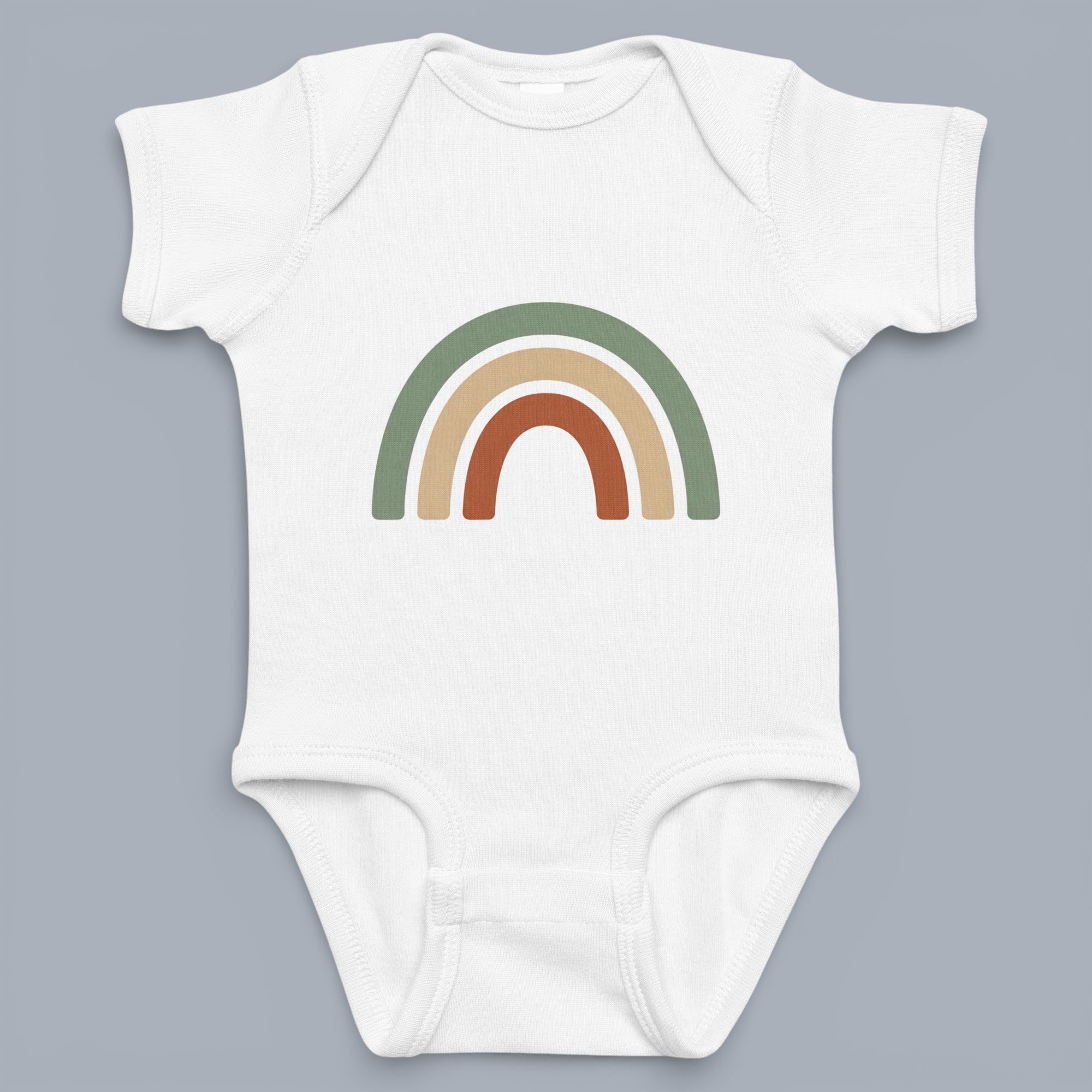 Coocosh baby bodysuit featuring a charming retro-inspired rainbow design in earthy tones of green, tan, and brown. The soft, breathable fabric ensures all-day comfort for your little one. A delightful and stylish addition to any baby's wardrobe. With shor