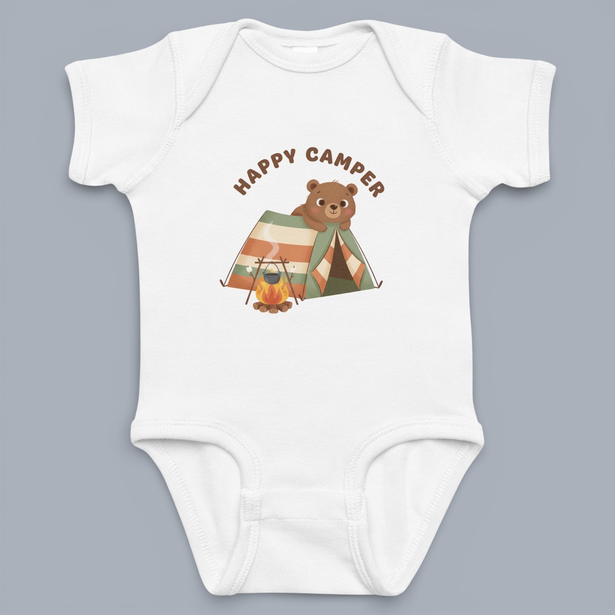 Coocosh Baby Bodysuit featuring a playful "Happy Camper" design with a cozy bear next to a tent and campfire, made of soft, white fabric, in a close-up studio shot. Period.