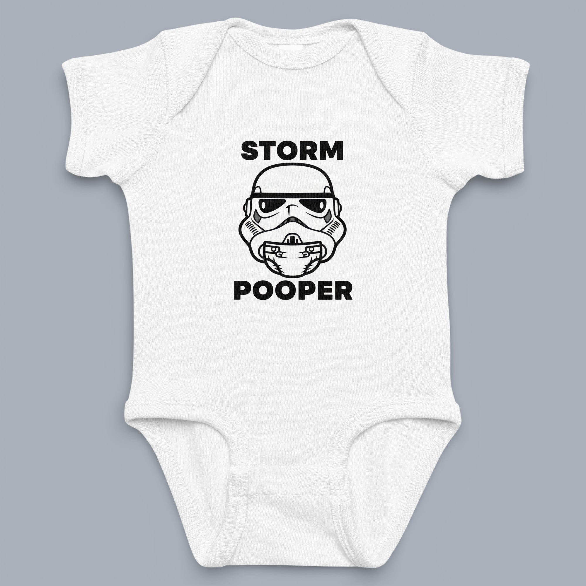 Coocosh Baby Onesie featuring a Stormtrooper helmet graphic and the humorous text "Storm Pooper." Made from soft, breathable white cotton for ultimate baby comfort. A funny gift.