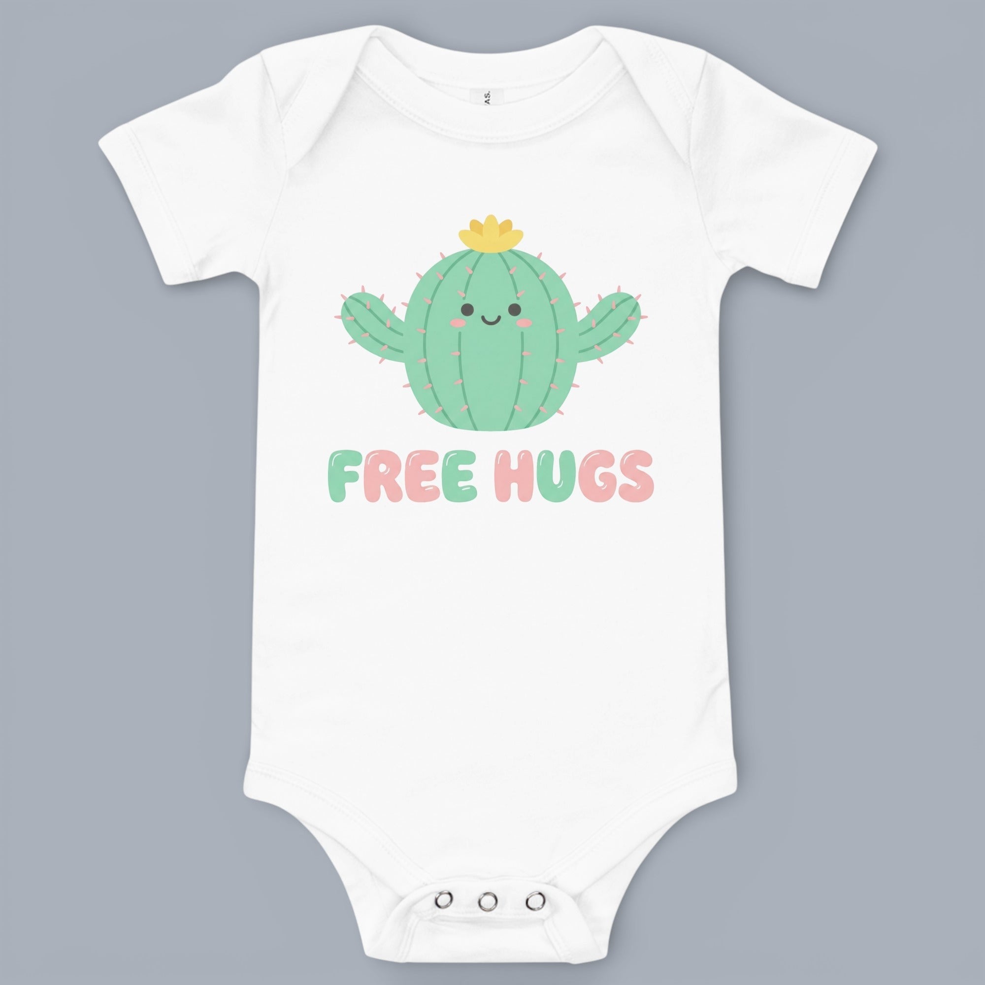Coocosh Baby Bodysuit featuring a cute cactus with a flower and the words "FREE HUGS", made of soft cotton, in white, for ages 0-24 months, flat lay view. Perfect for a baby shower gift.