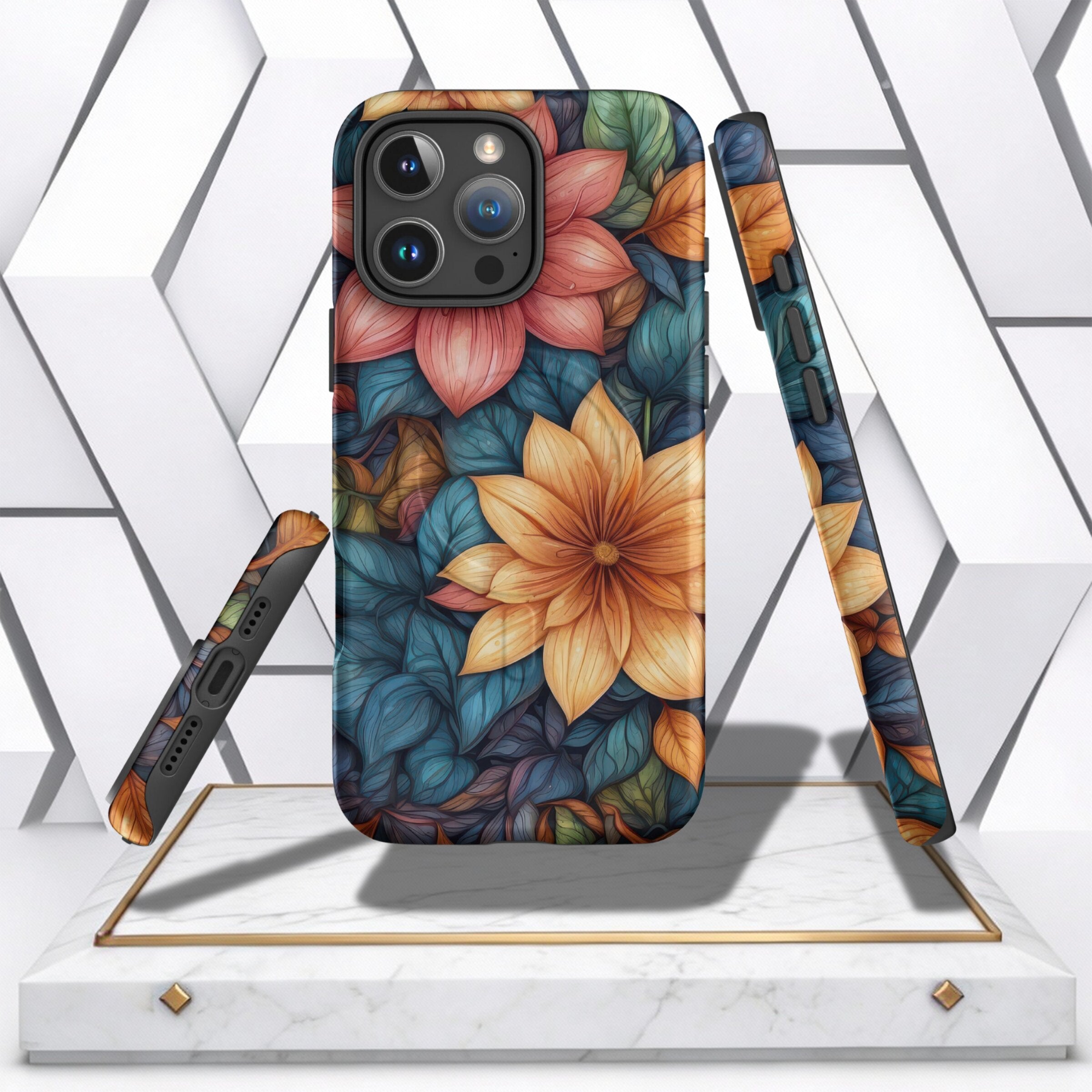 Coocosh phone case featuring a vibrant floral pattern with a large orange flower and contrasting blue leaves offers robust protection in a slim design. A stylish and functional accessory for your mobile device on a marble display. Protect your investment 