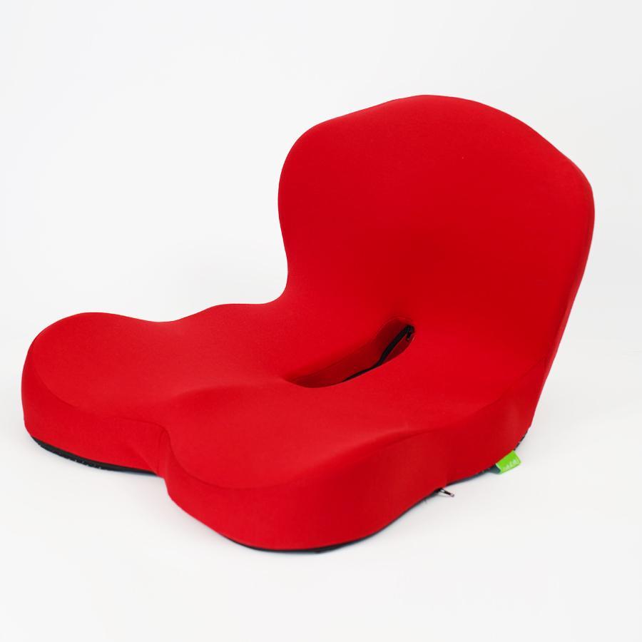 Coocosh orthopedic seat cushion providing coccyx and lumbar support, crafted from durable foam with a red cover. Ideal for office chairs or car seats. Comfortable seating solution.