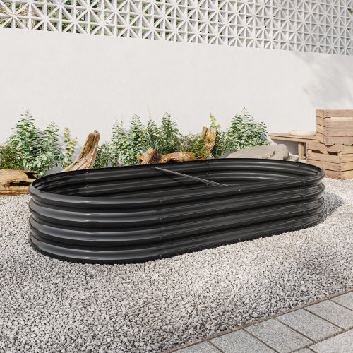 Coocosh black galvanized metal raised garden bed, emphasizing its oval shape and durable construction, designed for effective planting and optimal drainage in home gardens.