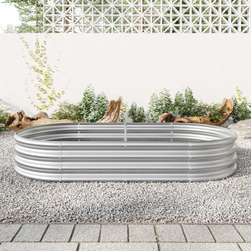 Coocosh oval raised garden bed constructed of robust galvanized metal, featuring a sleek black finish, ideal for nurturing a variety of plants while enhancing outdoor spaces.