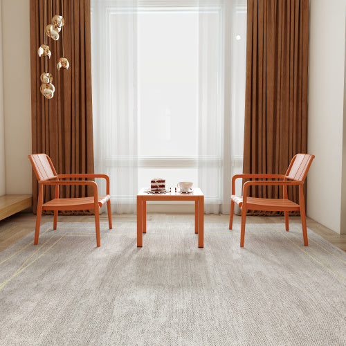 Coocosh indoor-outdoor chair and coffee table ensemble made from durable polypropylene in apricot brown, ideal for cozy patio conversations.