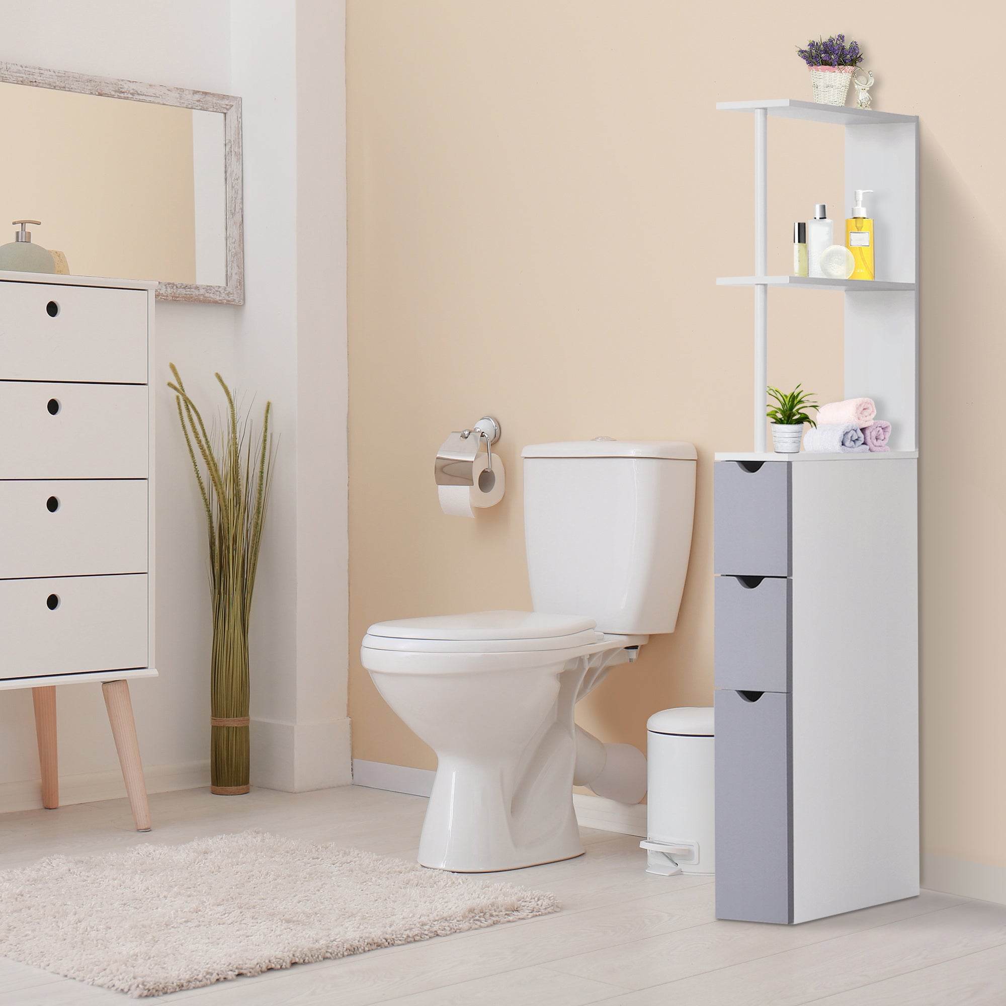 Coocosh bathroom shelving unit in white and gray, featuring a slim design with drawers and shelves, perfect for organizing toiletries next to a toilet in a clean, modern bathroom setting.