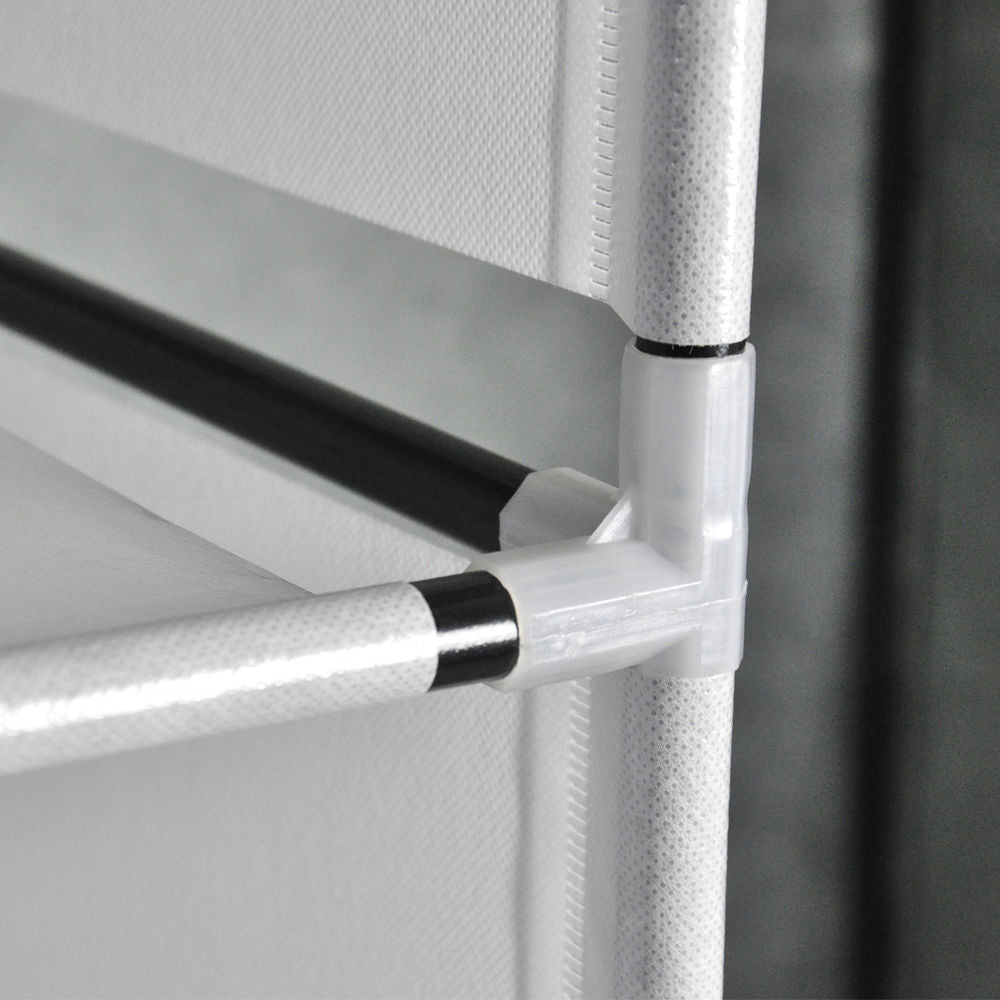 Coocosh closet wardrobe featuring a durable black steel frame, ample fabric shelves, and a zippered cover, perfect for organizing clothes in small apartments.