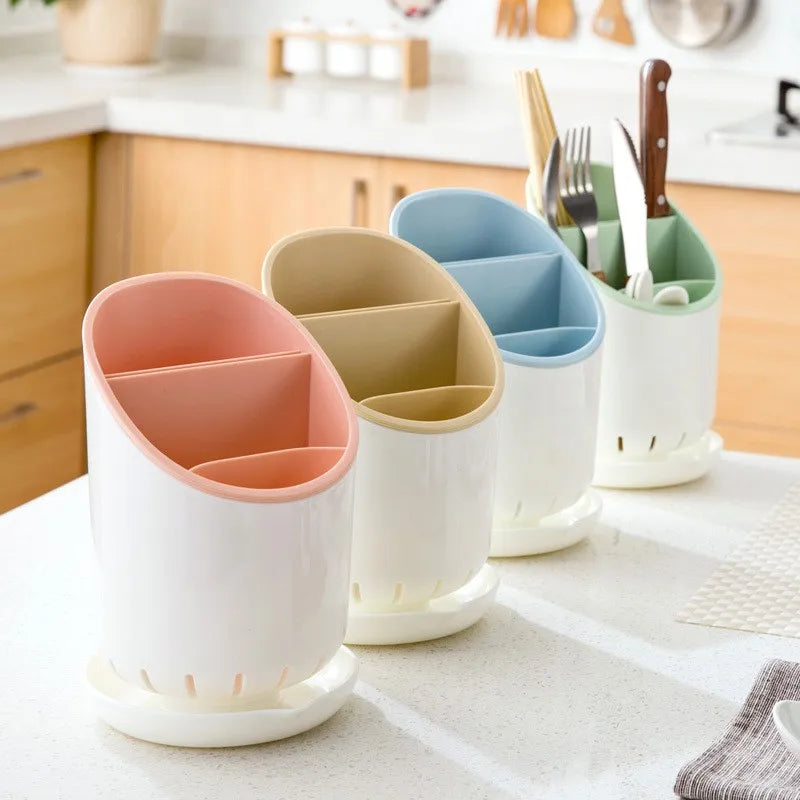 Coocosh's set of four multi-functional kitchen utensil holders, featuring vibrant interiors of pink, beige, blue, and green, elegantly organizes your utensils while enhancing your kitchen decor, offering a stylish and space-saving solution.