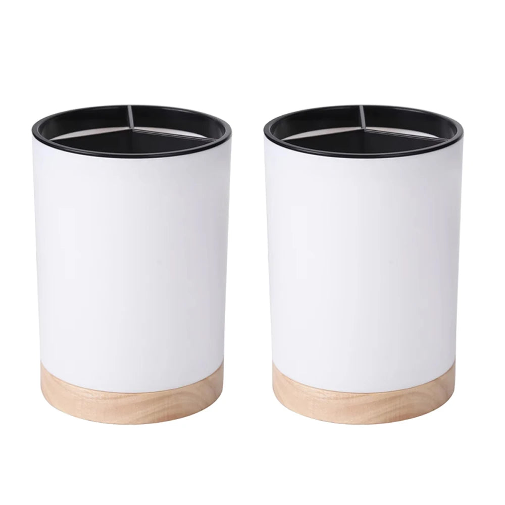 Coocosh elegant cylindrical cutlery drainer blends sleek black and white design with a natural wooden base, enhancing modern kitchen aesthetics while providing compact, moisture-filtered storage for utensils—perfect for organized, stylish cooking spaces.