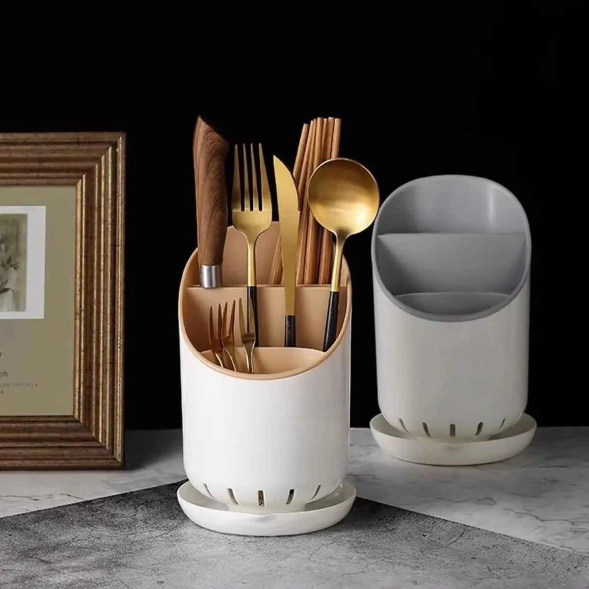 Coocosh minimalist space-saving utensil holders, featuring an elegant white design with natural wooden utensils and a sleek gray counterpart, ideal for enhancing kitchen organization while preventing bacteria. Perfect for modern, stylish homes.