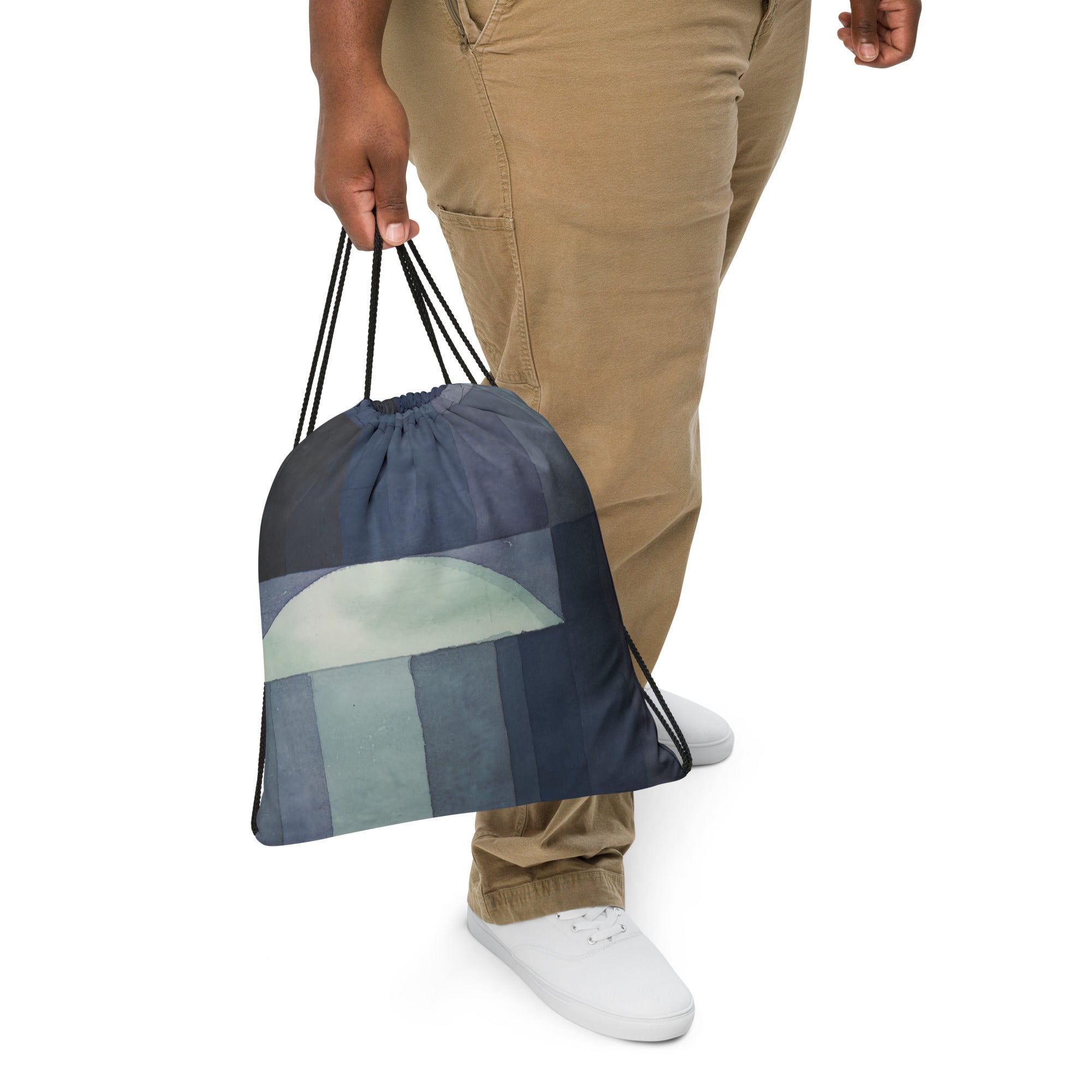 Coocosh's Der Bote des Herbstes drawstring bag showcases an abstract geometric design in soothing blue and gray tones. Perfect for an active lifestyle, its durable 100% polyester fabric and comfortable cotton handles ensure effortless style and convenience for gym or everyday use.