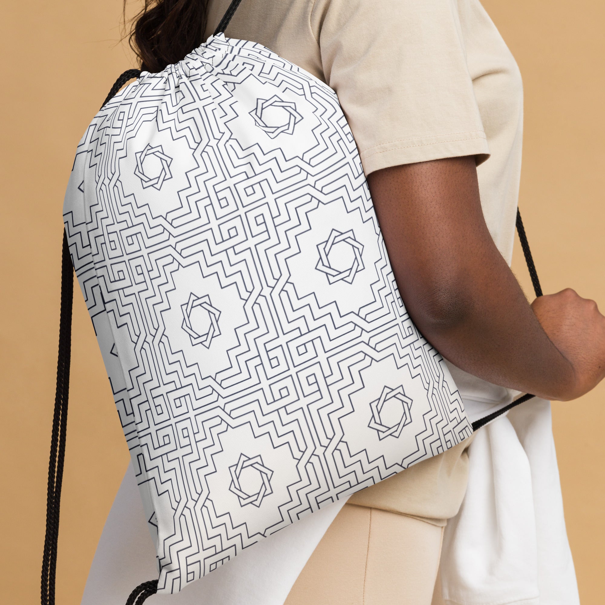 Coocosh Zenith Lattice drawstring bag in white with chic geometric patterns, designed for the modern lifestyle. Lightweight and versatile, it effortlessly complements your athletic or casual attire, making it perfect for gym sessions or daily adventures.