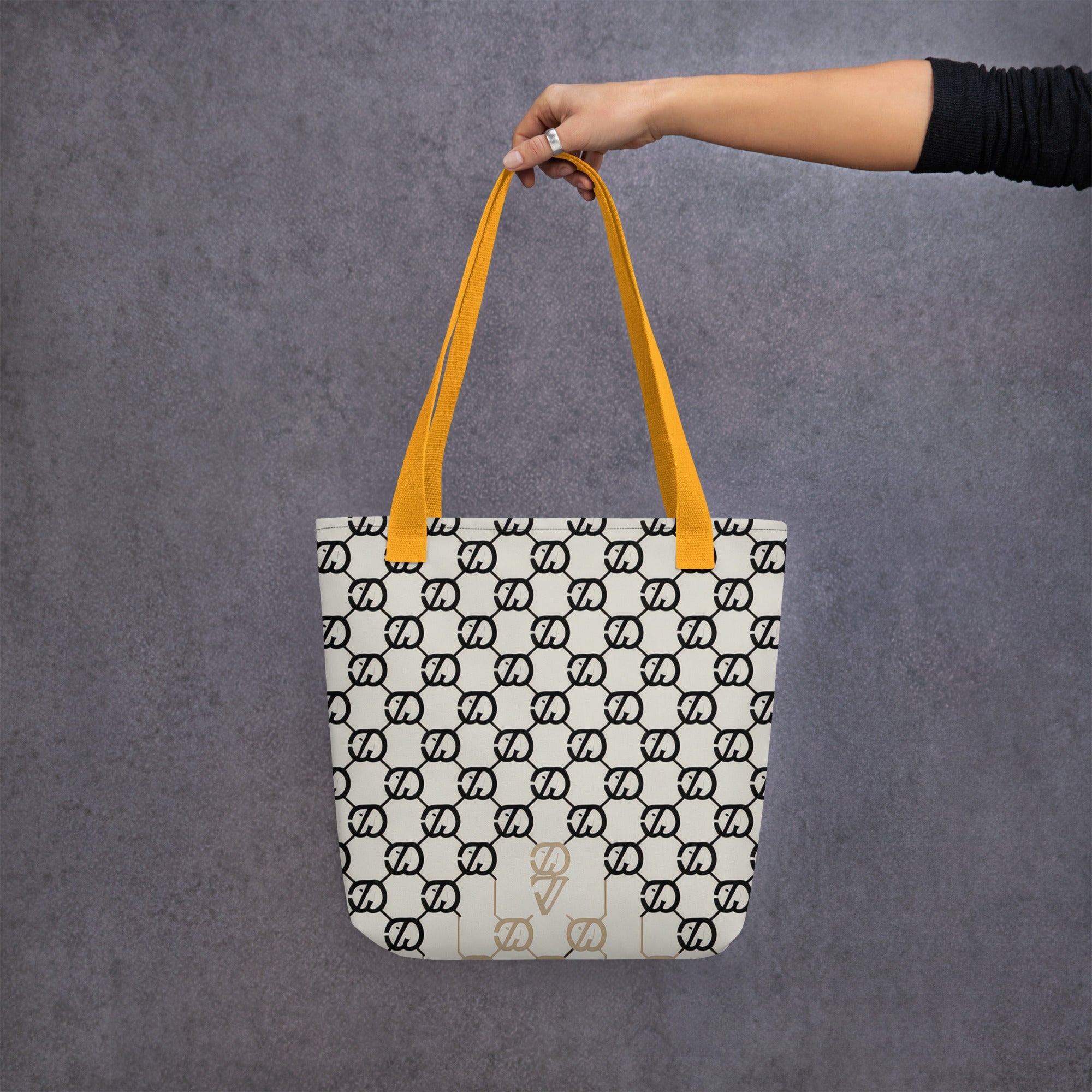 Coocosh Elite Cipher tote bag, elegantly designed with a striking black and white grid pattern and vibrant yellow straps, effortlessly merges style and functionality, making it the perfect accessory for chic urban outings or weekend adventures.