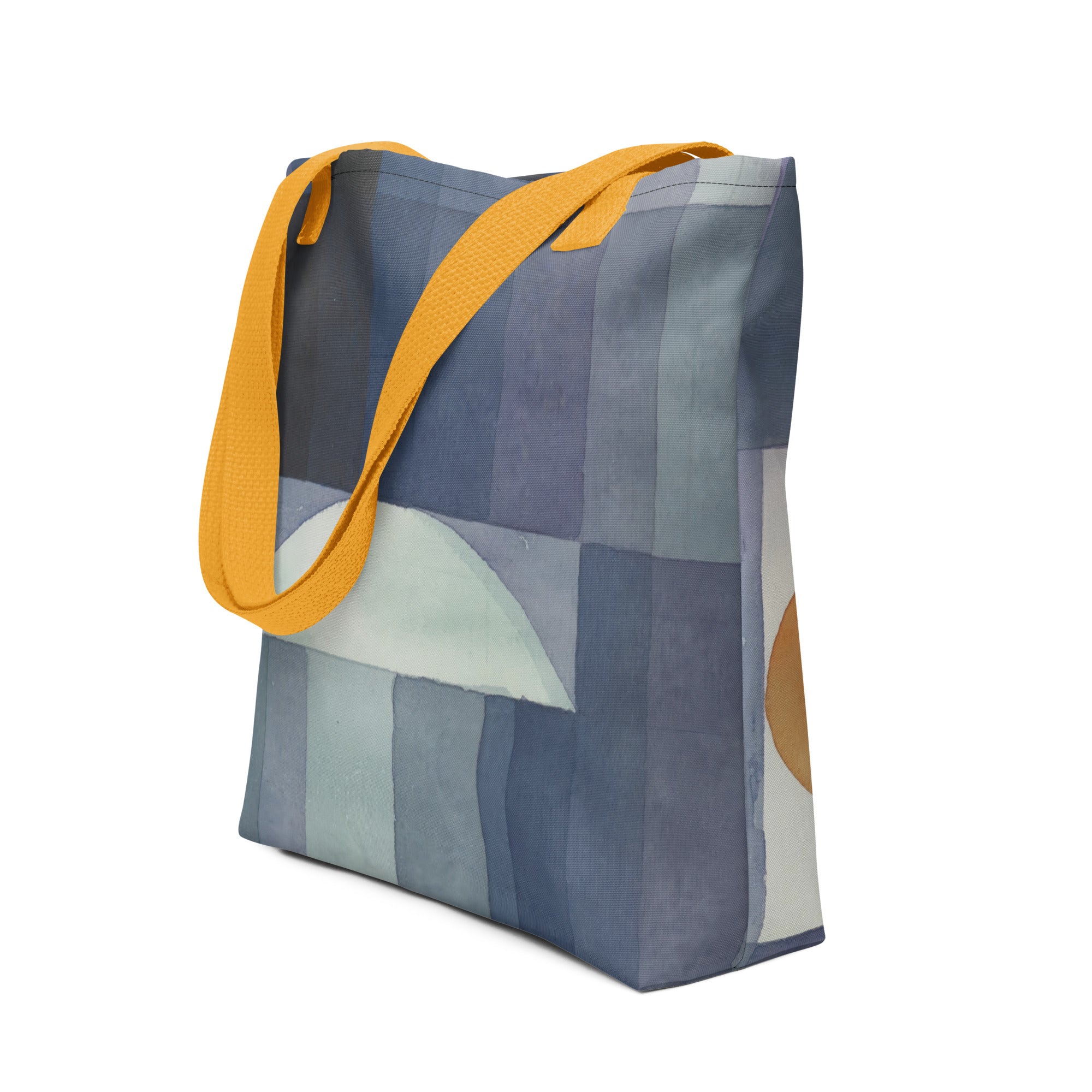 Coocosh's Der Bote des Herbstes tote bag features an eye-catching abstract geometric design in shades of blue, complemented by a vibrant yellow strap. Crafted from durable, eco-friendly polyester, this stylish and spacious bag seamlessly blends fall fashion with everyday functionality.