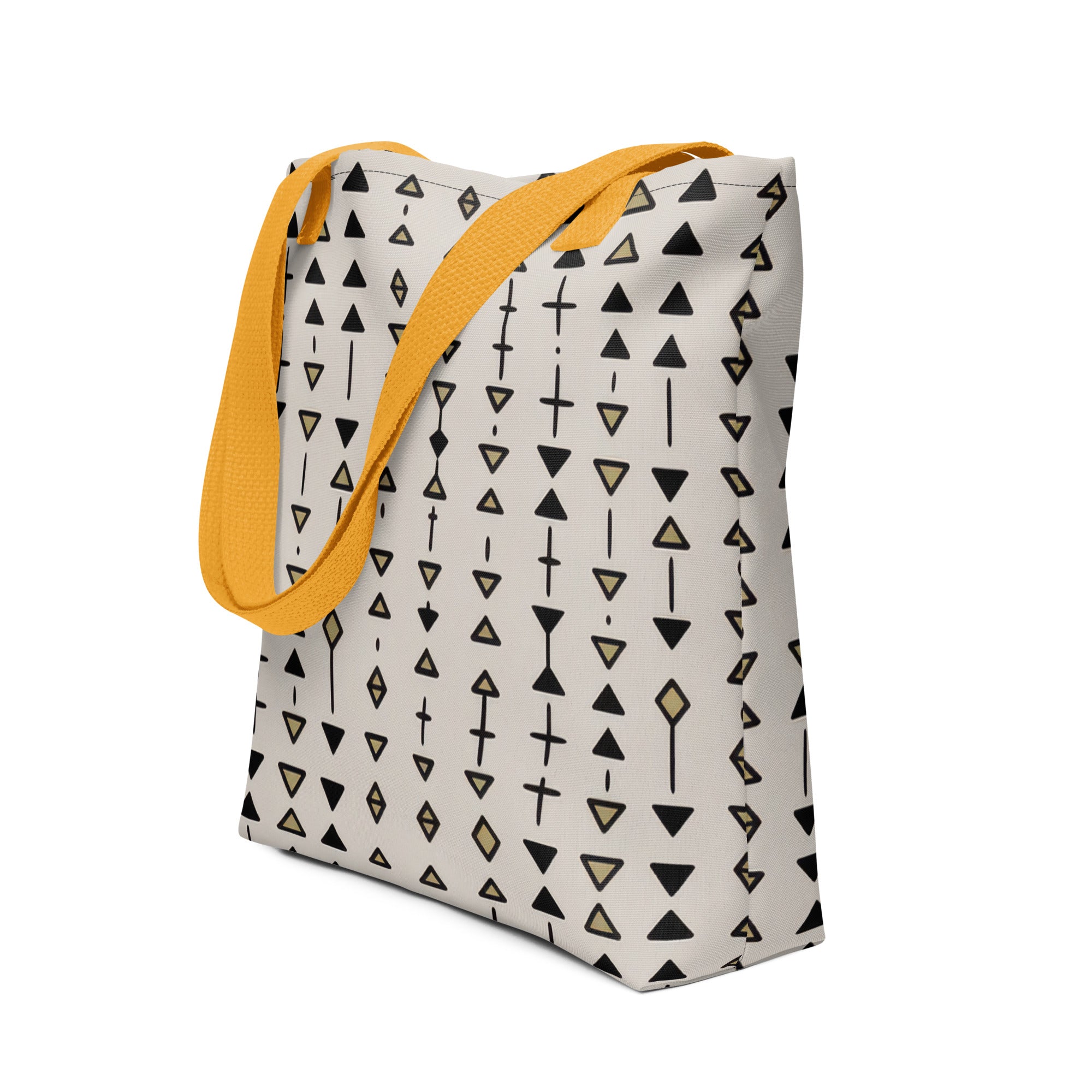 Coocosh Talisman Trail tote bag, featuring a striking black geometric pattern that embodies modern artistry, complemented by a vibrant yellow shoulder strap for effortless elegance, making it a versatile companion for urban adventures.