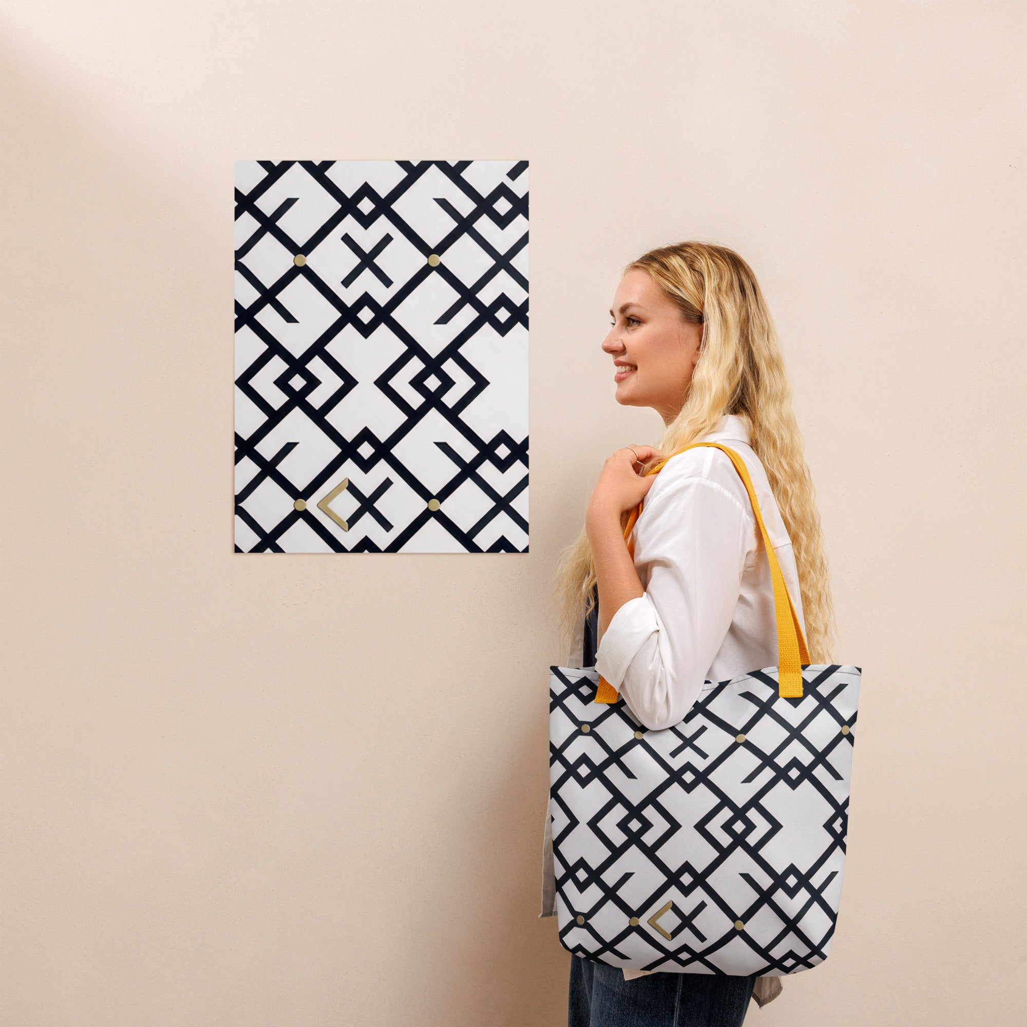 Coocosh Midnight Meridian tote bag, adorned with a striking black and white geometric pattern, seamlessly merges style and function. Crafted from durable, weather-resistant polyester, it's the perfect companion for effortless elegance on the go.