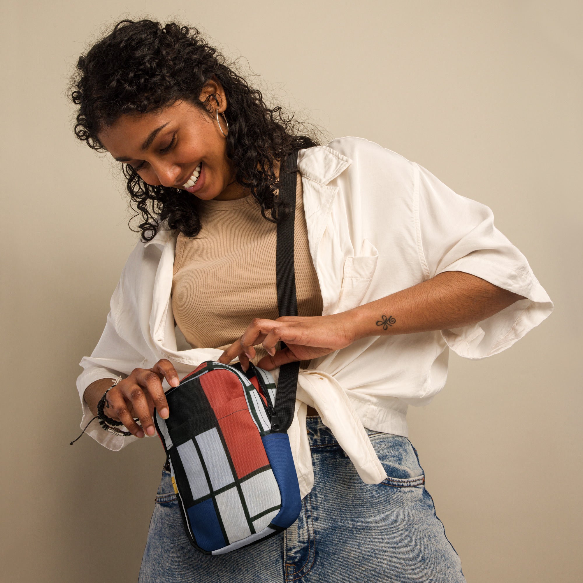 Coocosh Utility Crossbody Bag, artfully adorned with an abstract geometric design, blends vibrant style and organized storage. Crafted from water-resistant polyester, it’s the perfect companion for urban explorers and festival-goers alike.