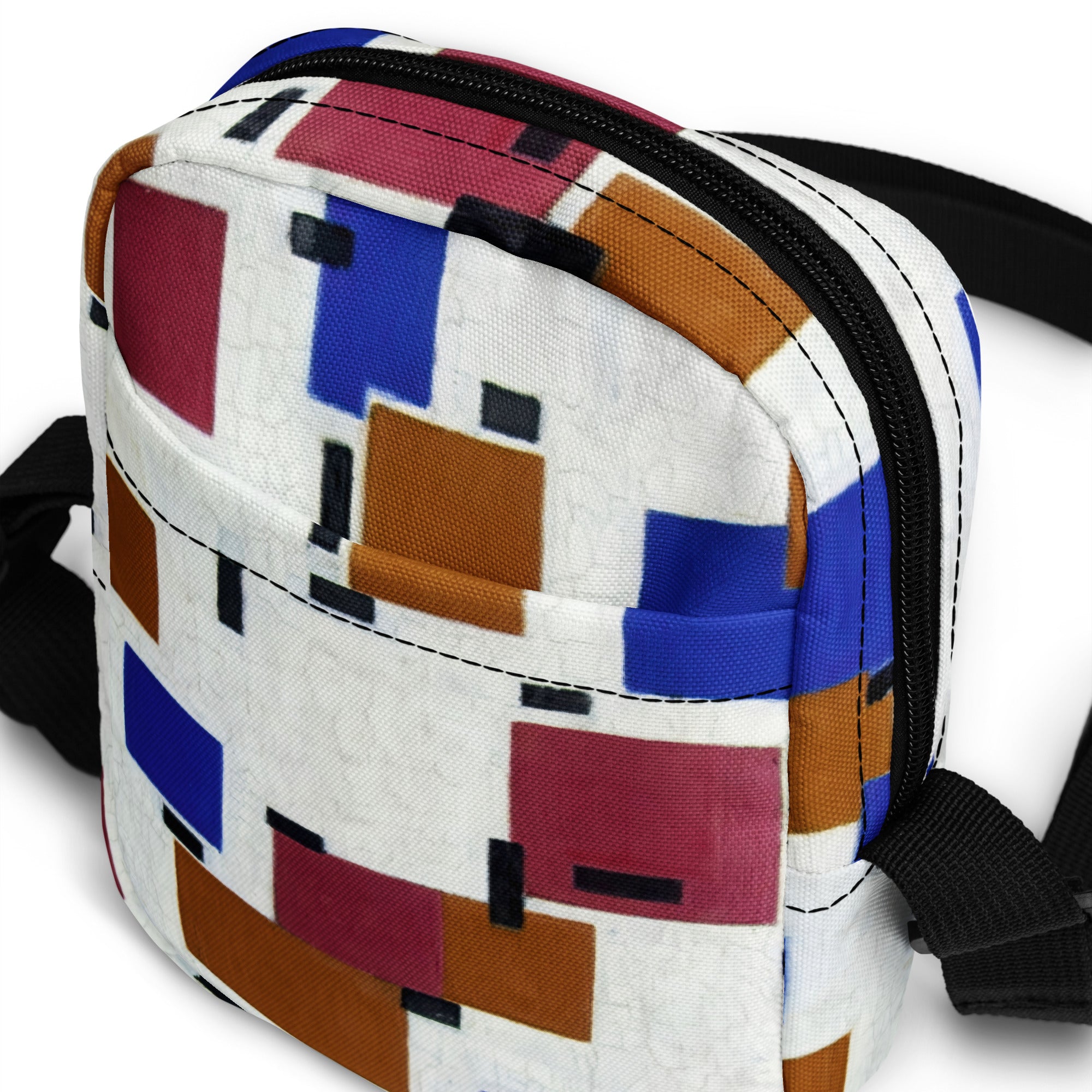 Coocosh utility crossbody bag in vibrant geometric patterns, featuring a water-resistant polyester design and adjustable strap, perfect for organized storage on hikes or festivals while elevating your style with every step.
