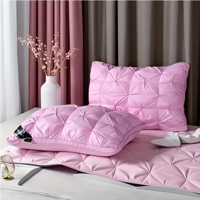 Coocosh Bedding Set with Quilted Design, Soft Pink Color, Includes Two Pillows and Mattress Cover, Featuring Luxurious Fabric and Modern Aesthetic, Dimensions Fit Standard Size Bed, Lifestyle Scene with Elegant Decor.