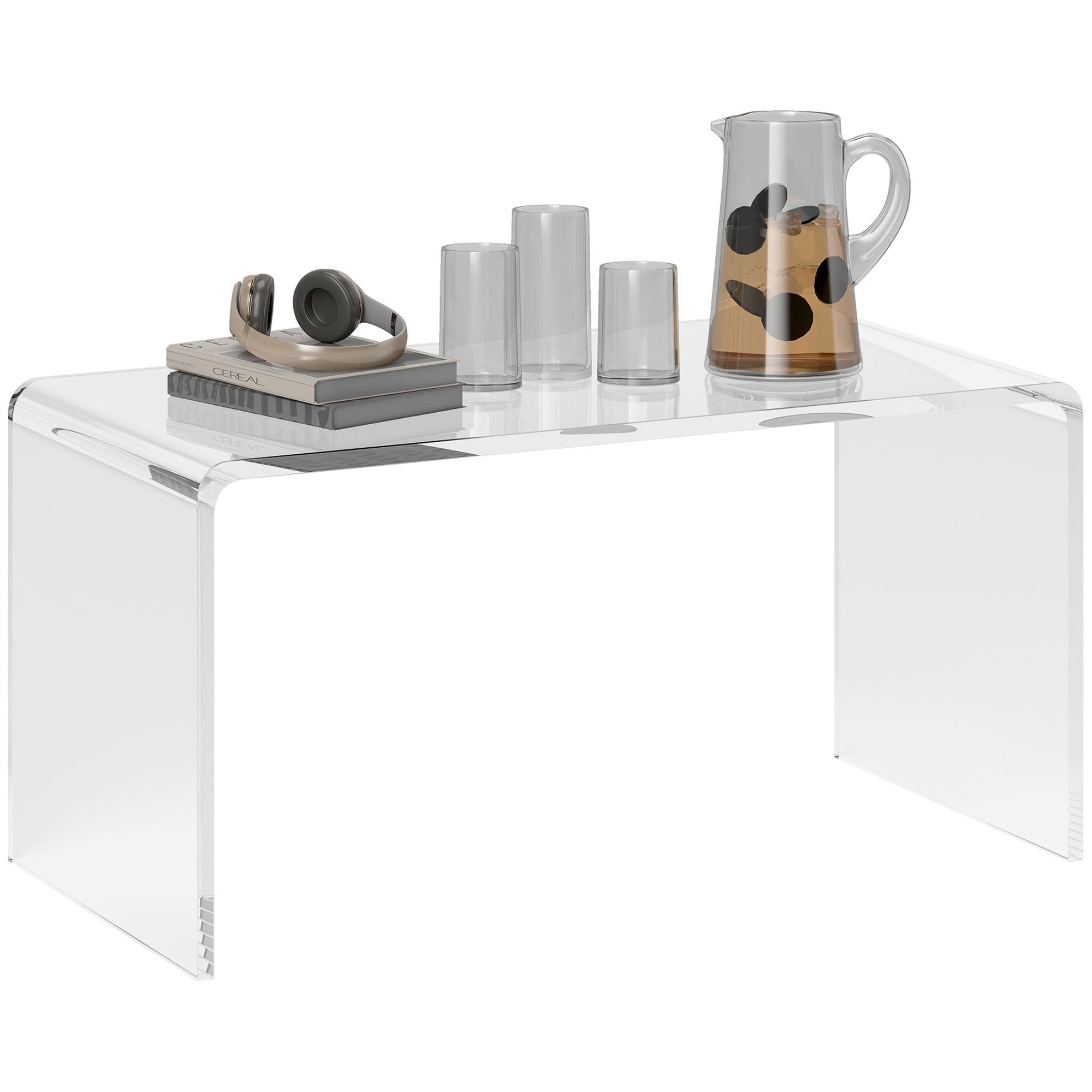 Coocosh Clear Acrylic Coffee Table with Minimalist Design, 48 x 24 x 18 inches, showcasing a sleek surface adorned with books, glasses, and a pitcher, ideal for modern living spaces.