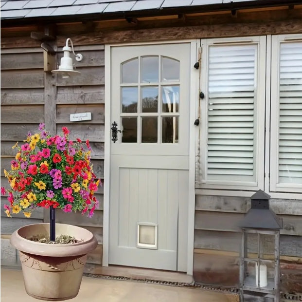 Coocosh artificial floral arrangement featuring realistic red and green imitation flowers with durable ground stakes, perfect for brightening up garden spaces or patios.