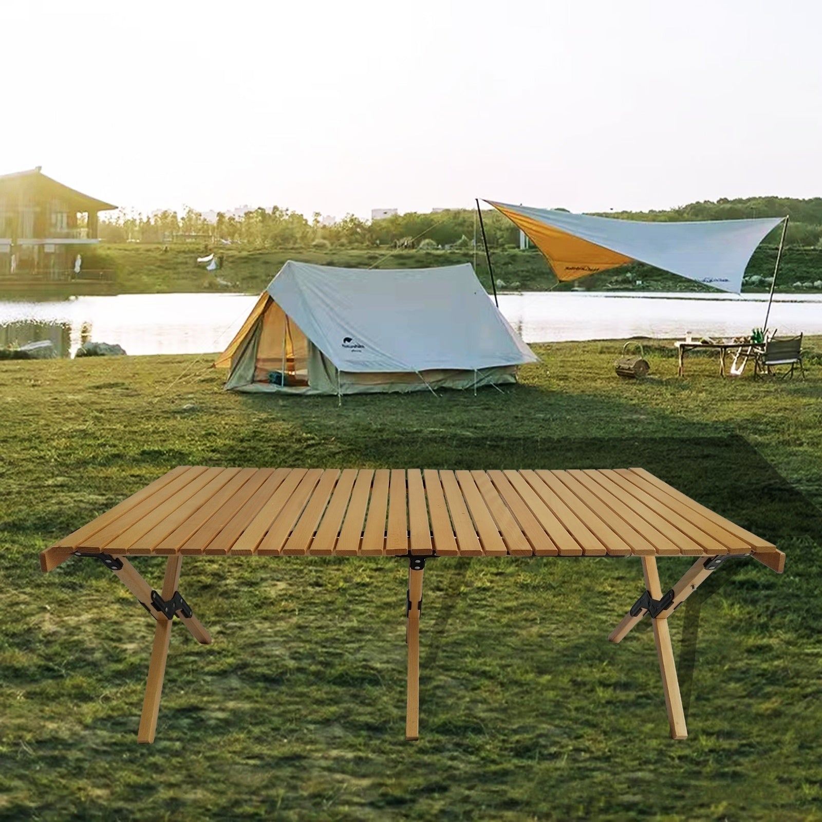 Coocosh wooden slatted roll-top camping table with sturdy X-shaped legs, perfect for outdoor adventures and picnics, viewed from a low-angle main perspective during daytime.