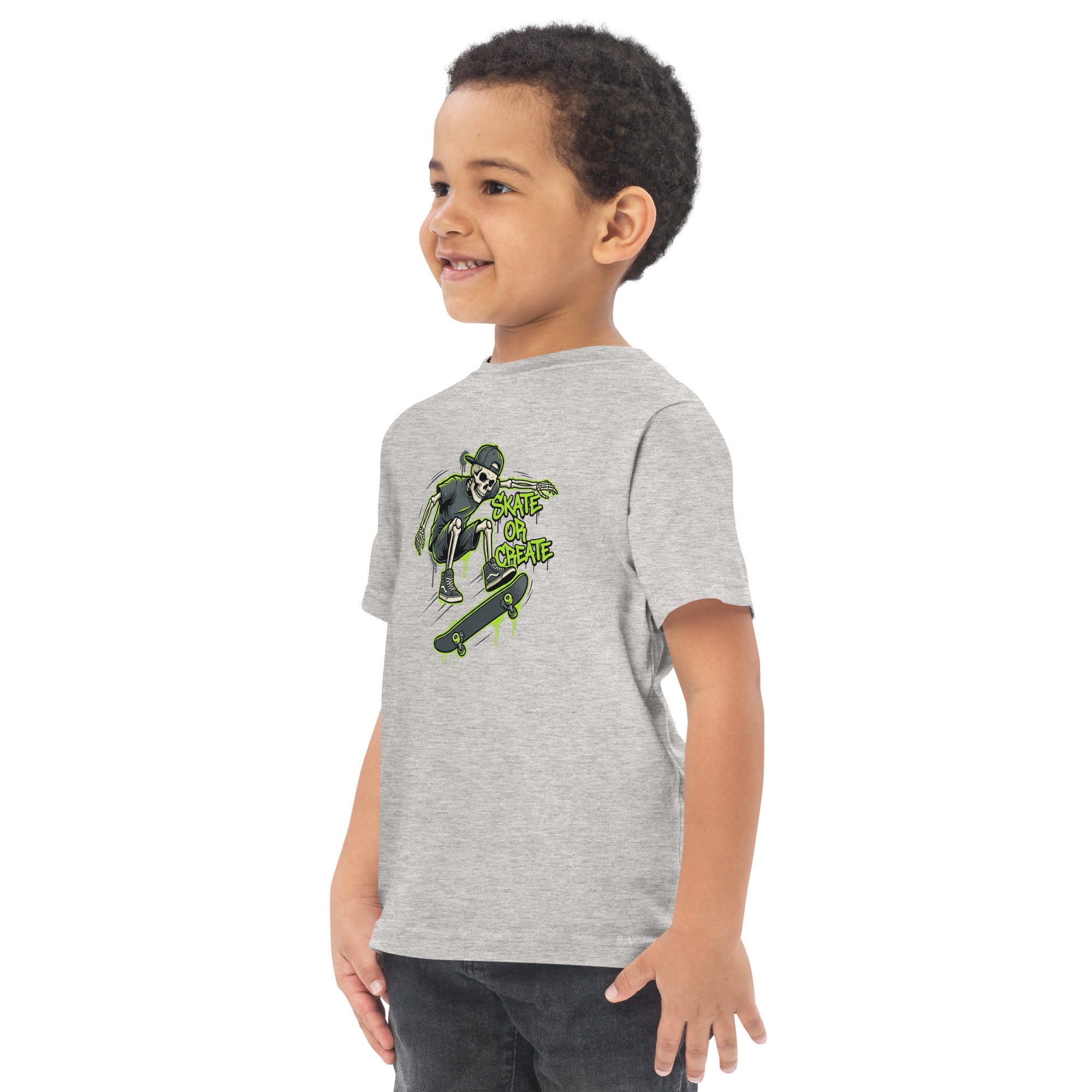 Coocosh's cotton toddler t-shirt highlighting a skeleton skateboarder, great for kids who love fun graphics and comfortable clothing.