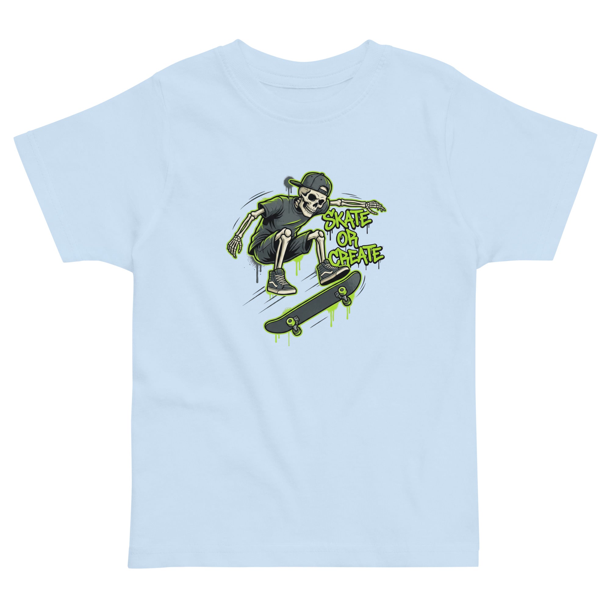 Coocosh T-shirt with a skeleton skateboarding graphic, designed with the words "Skate or Create" in vibrant green. The light blue tee is perfect for young skaters. A fun look!.