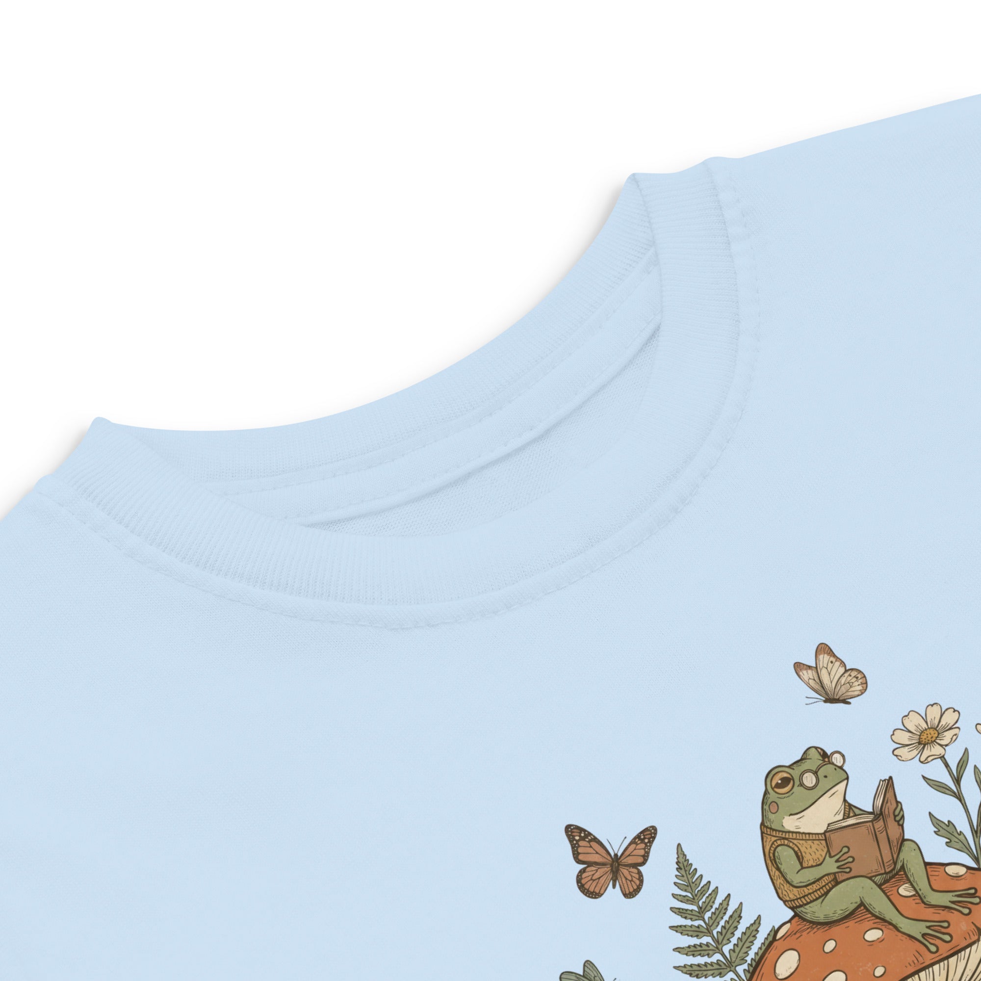 Coocosh's delightful bodysuit featuring whimsical elements like flowers and frogs, made with comfort in mind from soft cotton in sunny yellow.