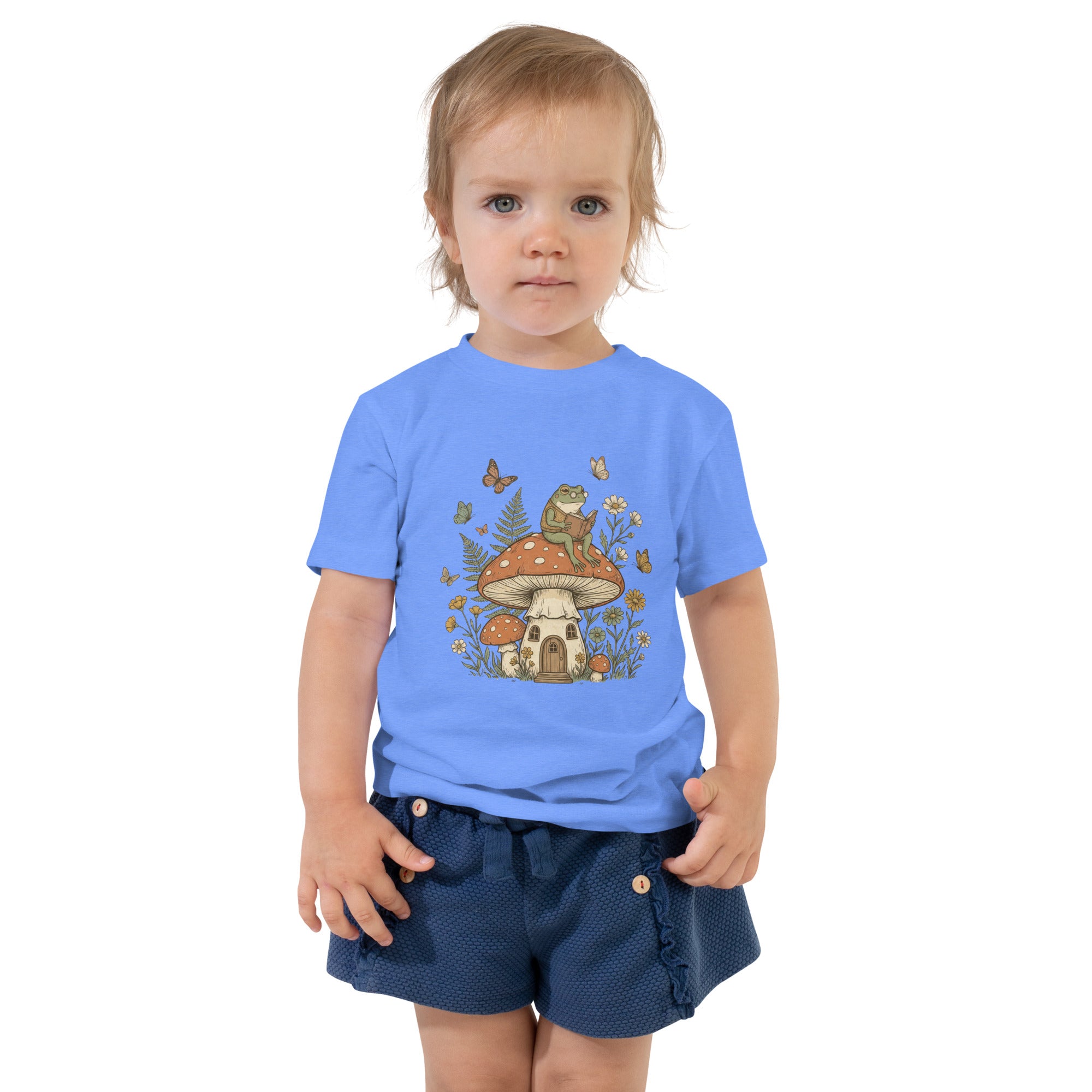 Coocosh short sleeve t-shirt made from high-quality cotton, showcasing a playful frog alongside mushrooms, perfect for toddlers' daily adventures.