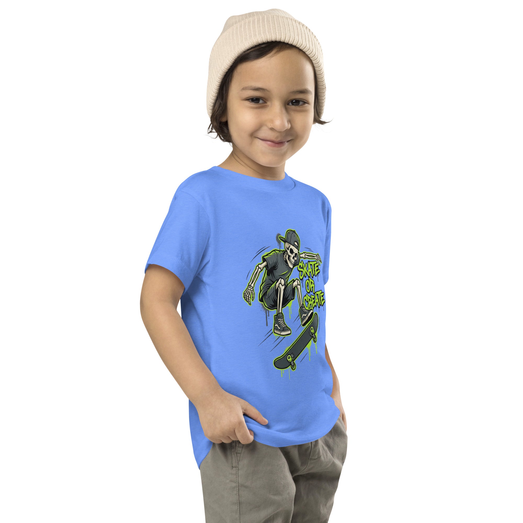 Coocosh toddler tee in vibrant lime green, decorated with a spirited skeleton skater, ideal for little adventurers.