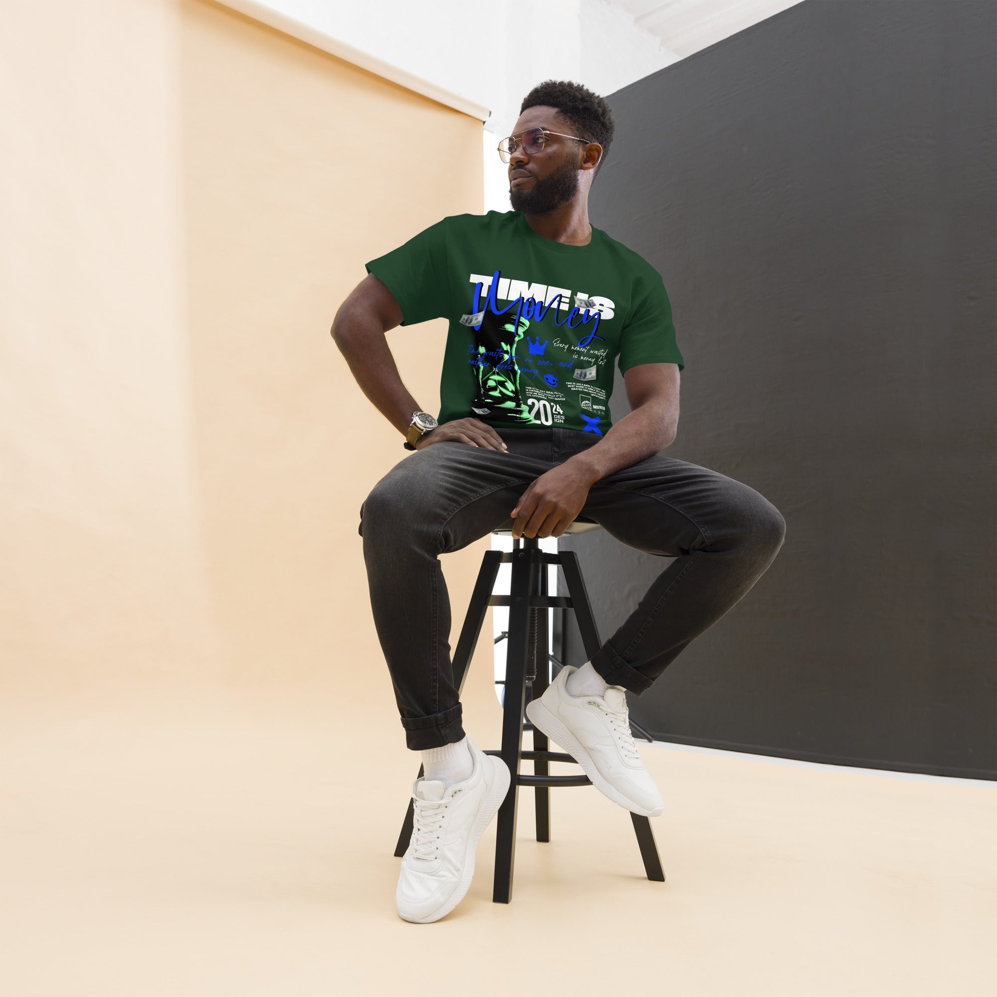 Coocosh's unisex Classic Tee, featuring an hourglass "Time is Money" design, is a canvas of comfort in breathable 100% cotton. Effortlessly stylish against a soft studio backdrop, it embodies the essence of versatile streetwear for today's dynamic lifestyles.
