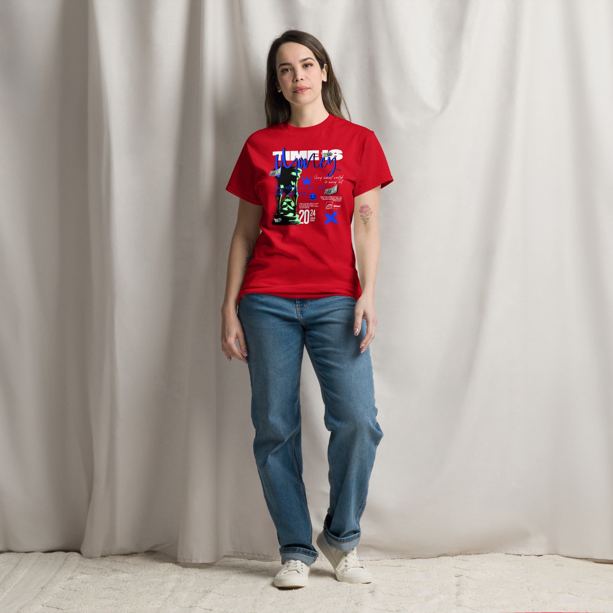 Coocosh unisex classic tee featuring the 'Time is Money' hourglass design, crafted from 100% breathable cotton for ultimate comfort. This stylish red shirt pairs effortlessly with blue jeans, embodying modern streetwear that elevates your everyday look.